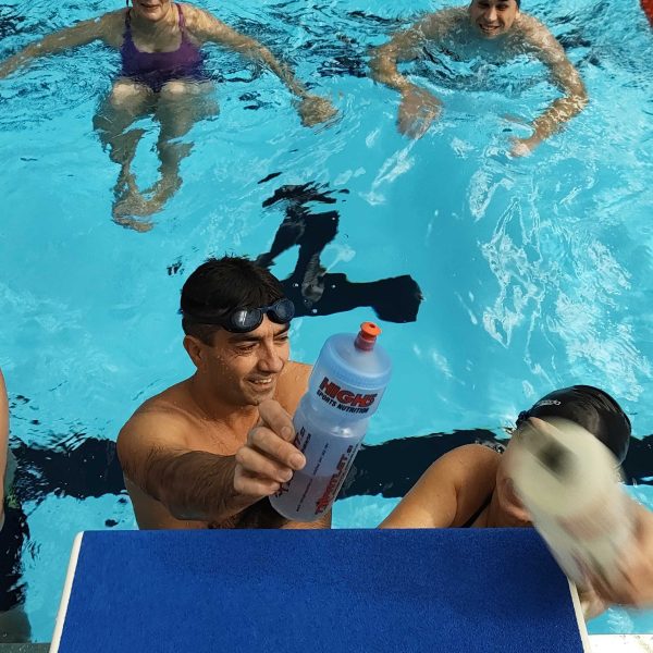 Plavalci med treningom plavanja za odrasle na prenovljenem kopališču Ilirija